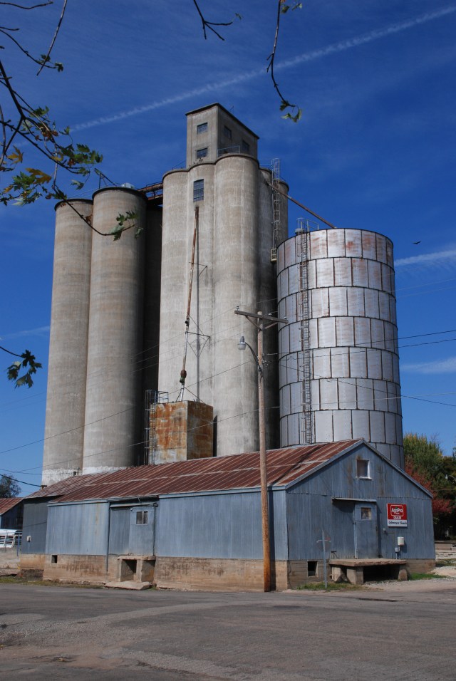 The elevator built by J. H. Tillotson is flanked by later additions.