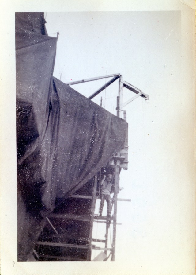 This photo, provided by Kristen Cart from Osborn family archives, shows a deckhand standing nonchalantly on elevator formwork. Kristen believes the picture may have been taken in Giddings, Texas, in 1945.