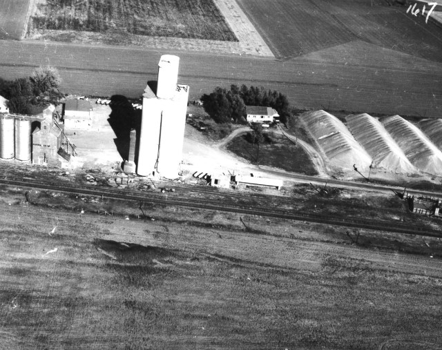 This photo, provided by Kurtis Glinn, shows Tillotson Construction's Murphy elevator in the early 1960s. Note the ground storage of grain sorghum on the right. 